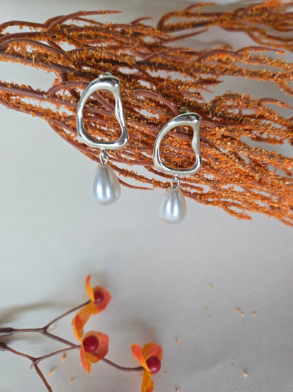 Pearl Drop Earrings with open silver-tone frames and white teardrop pearl drops