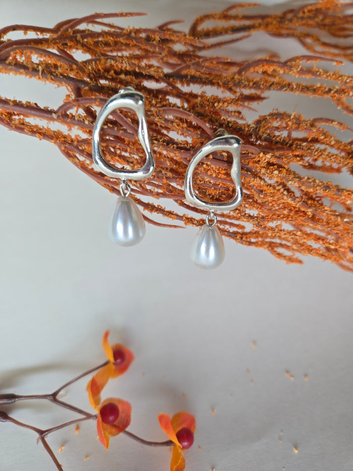 Pearl Drop Earrings with open silver-tone frames and white teardrop pearl drops