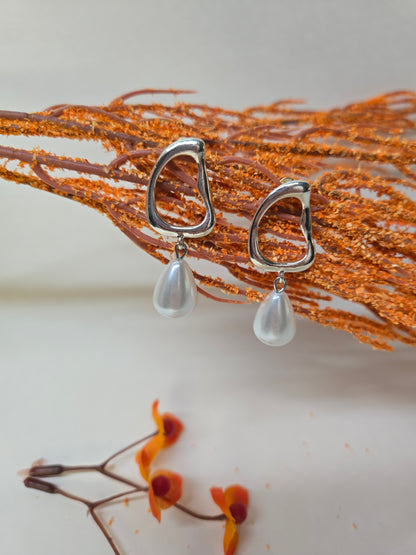 Pearl Drop Earrings with open silver-tone frames and white teardrop pearl drops, view 2