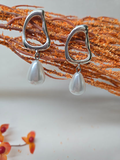 Pearl Drop Earrings with open silver-tone frames and white teardrop pearl drops, view 3