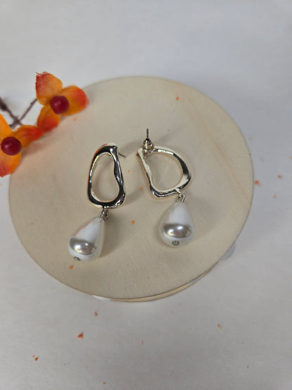 Pearl Drop Earrings with open silver-tone frames and white teardrop pearl drops, view 4