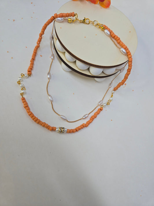 Sunset Pearl Orange Beaded Necklace with orange chip beads and white accents, view 2