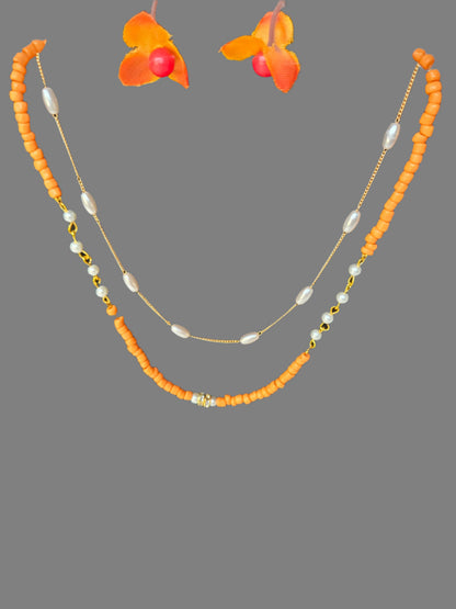 Sunset Pearl Orange Beaded Necklace with orange chip beads and white accents, view 4