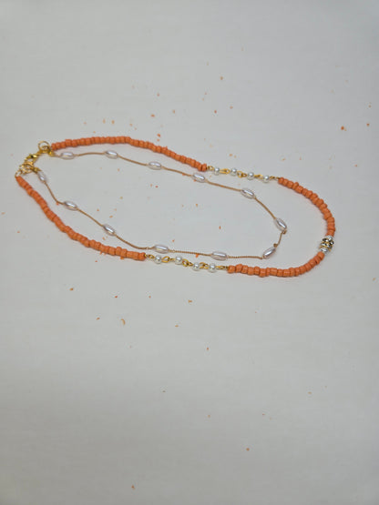 Sunset Pearl Orange Beaded Necklace with orange chip beads and white accents, view 3