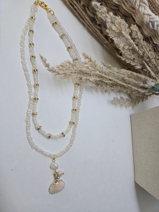 Sea Pearl Necklace with two layers of white beads, gold-tone accents and a shell charm, view 2