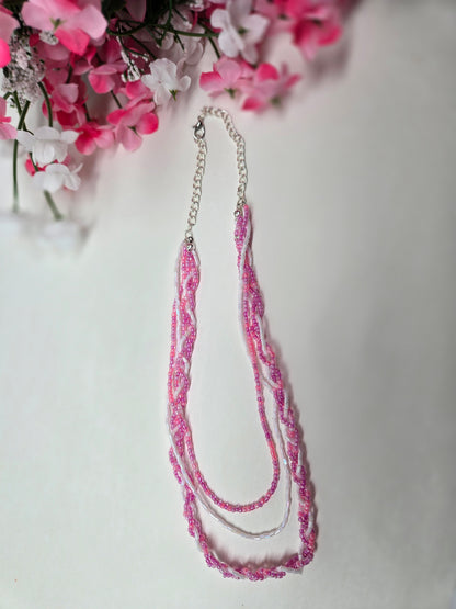 Rosy Whisper Necklace with pink braided beadwork on an adjustable silver chain