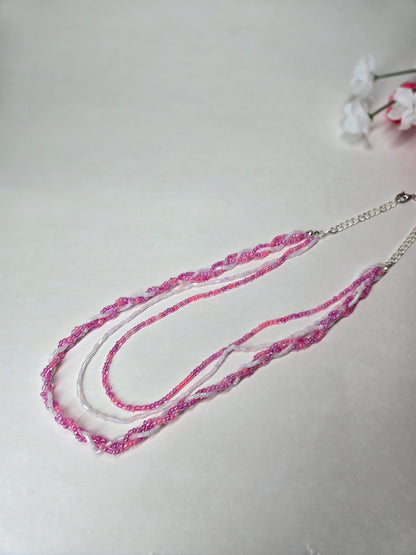 Rosy Whisper Necklace with pink braided beadwork on an adjustable silver chain, view 7