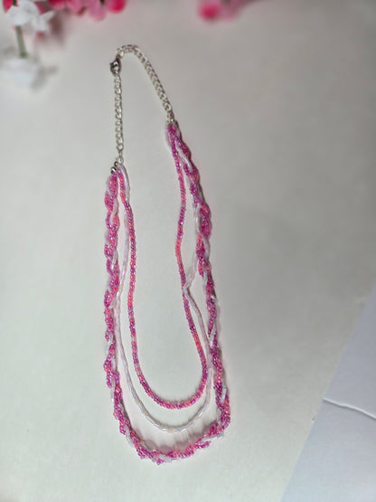Rosy Whisper Necklace with pink braided beadwork on an adjustable silver chain, view 8