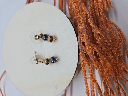 Twilight Drops Earrings with two black hematite beads and gold-tone accents, view 3