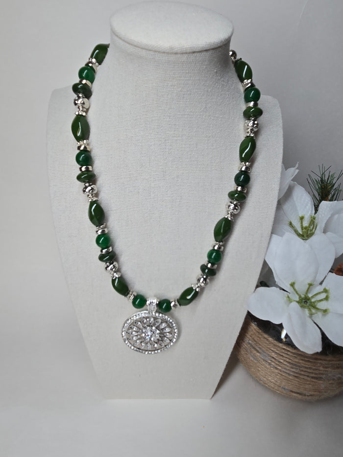 Verdant Queen Necklace with green beads, silver spacers and a round crystal pendant