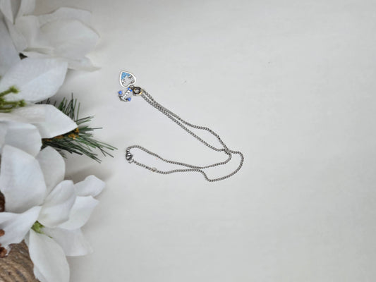 Soul Anchor Charm Necklace with anchor and open-heart charms on a stainless steel chain, view 2
