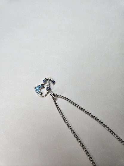 Soul Anchor Charm Necklace with anchor and open-heart charms on a stainless steel chain