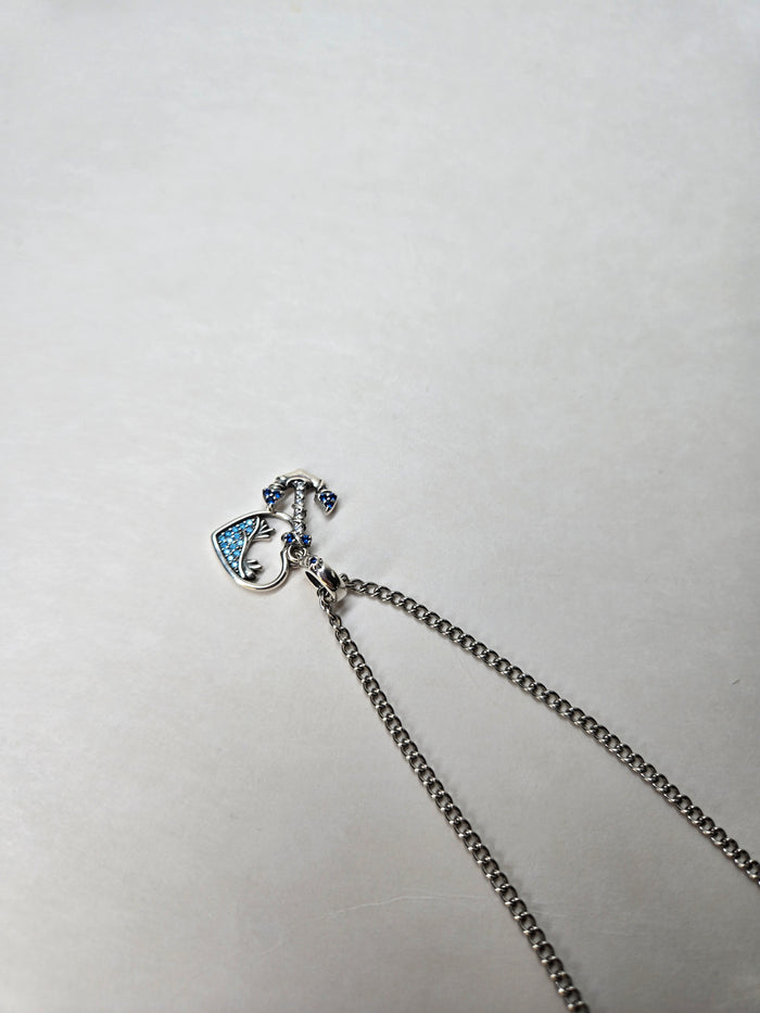 Soul Anchor Charm Necklace with anchor and open-heart charms on a stainless steel chain