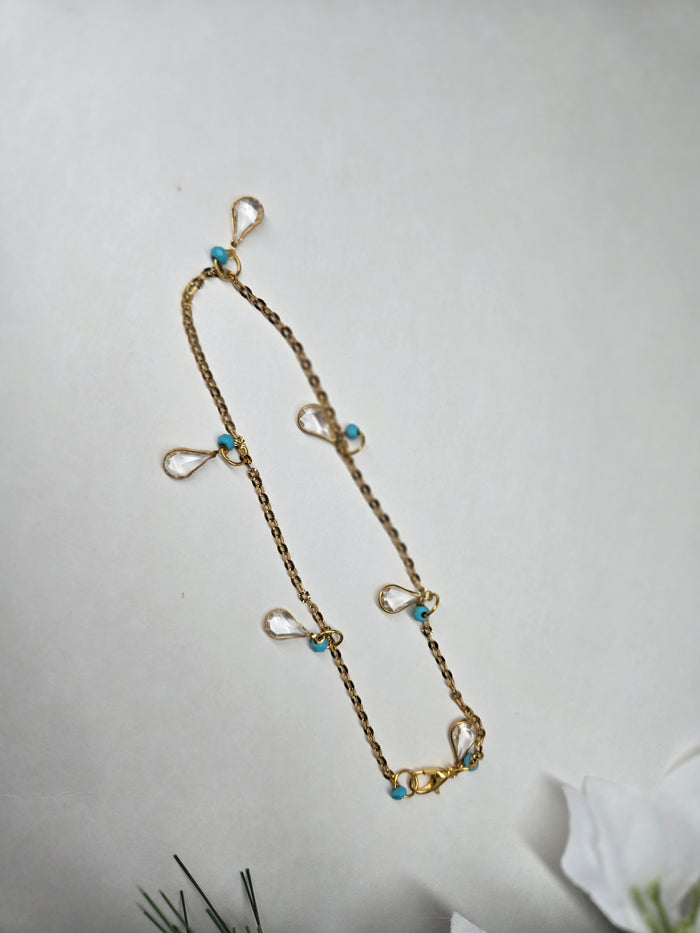 Step of Grace Anklet with gold-plated chain, clear teardrop charms and turquoise beads