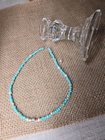 Sands & Waves Beaded Necklace with turquoise-colored and cream beads and metallic spacers