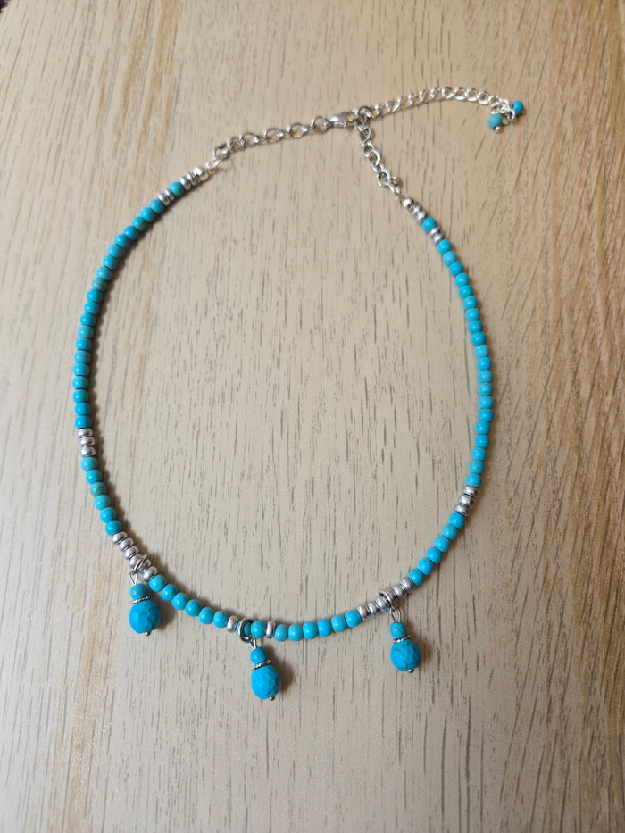 Ocean Drops Turquoise-Tone Necklace with turquoise-colored beads and three teardrop accents