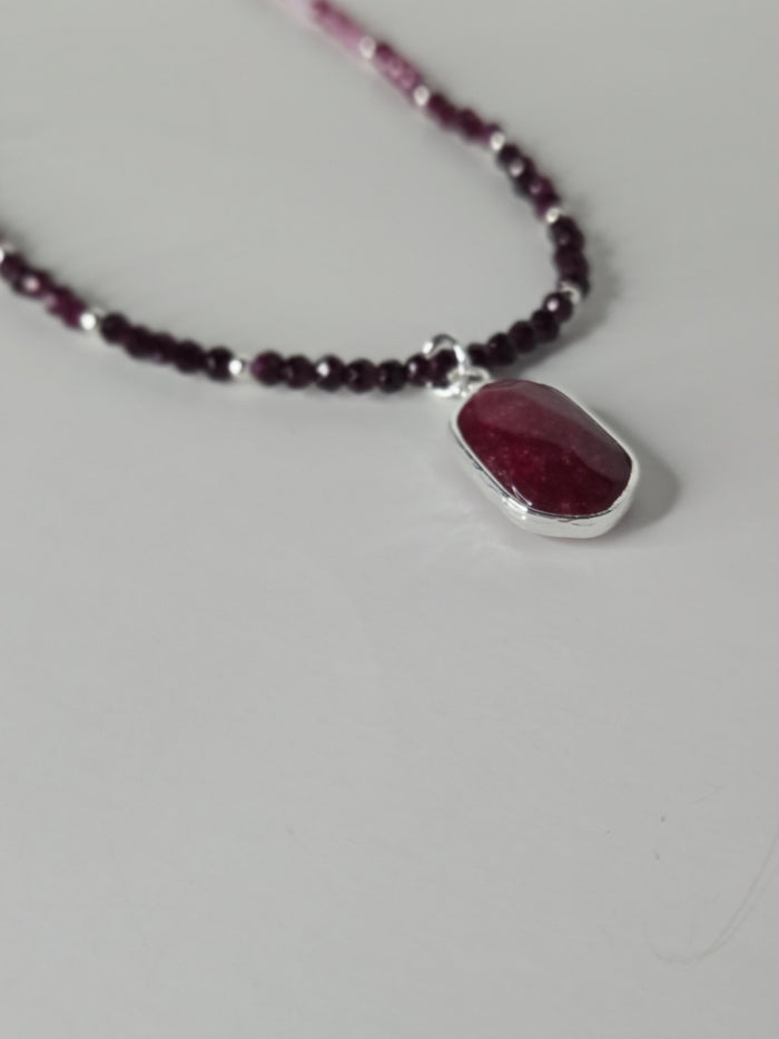Royal Ruby Touch Necklace with deep violet beads and a dark red jade center stone