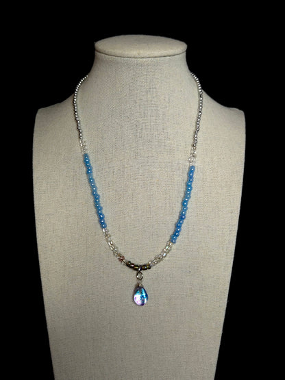 Blue Teardrop Necklace with clear-to-blue glass beads and a blue-violet teardrop pendant, view 4