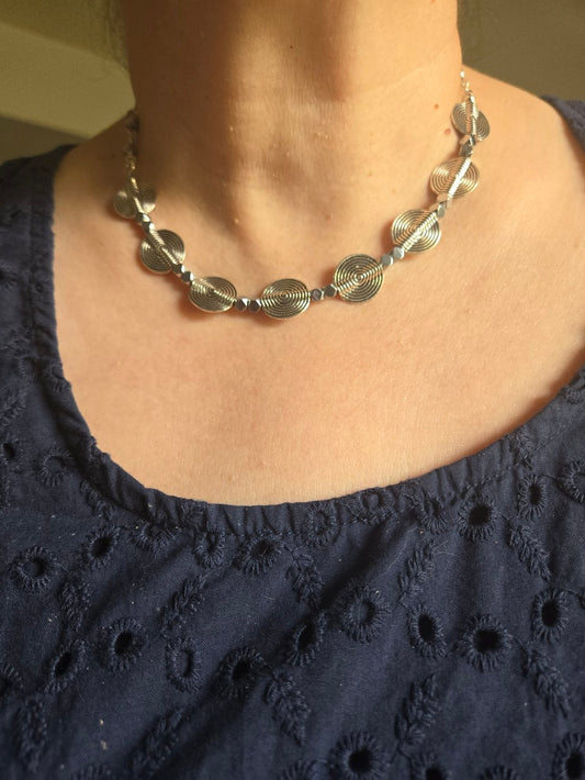 Moon Aura Gray Beaded Jewelry necklace with silver-tone spiral discs and matching earrings, view 2