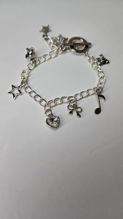 Silver Melody Charm Bracelet with star, bow, heart and musical note charms, view 2