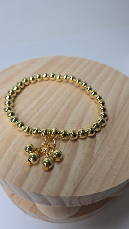 Golden Glow Bracelet of gold-tone round beads with four small ball charms, view 2