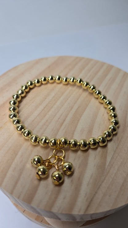 Golden Glow Bracelet of gold-tone round beads with four small ball charms, view 3