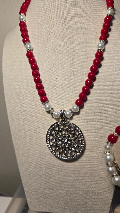 Cherry Touch Set, a necklace and bracelet of red beads, white pearls and silver accents, view 5