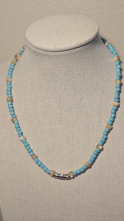 Sea Breeze Necklace with turquoise and ivory beads and silver details