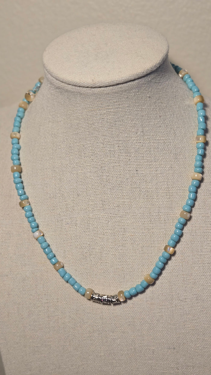 Sea Breeze Necklace with turquoise and ivory beads and silver details