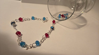 Dual Elegance Necklace with deep blue and red beads on a silver chain, view 5