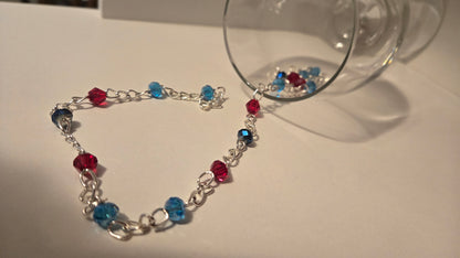 Dual Elegance Necklace with deep blue and red beads on a silver chain, view 6