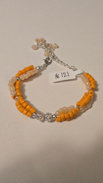 Sunny Charm Bracelet with yellow beads, translucent accents and a crystal centerpiece