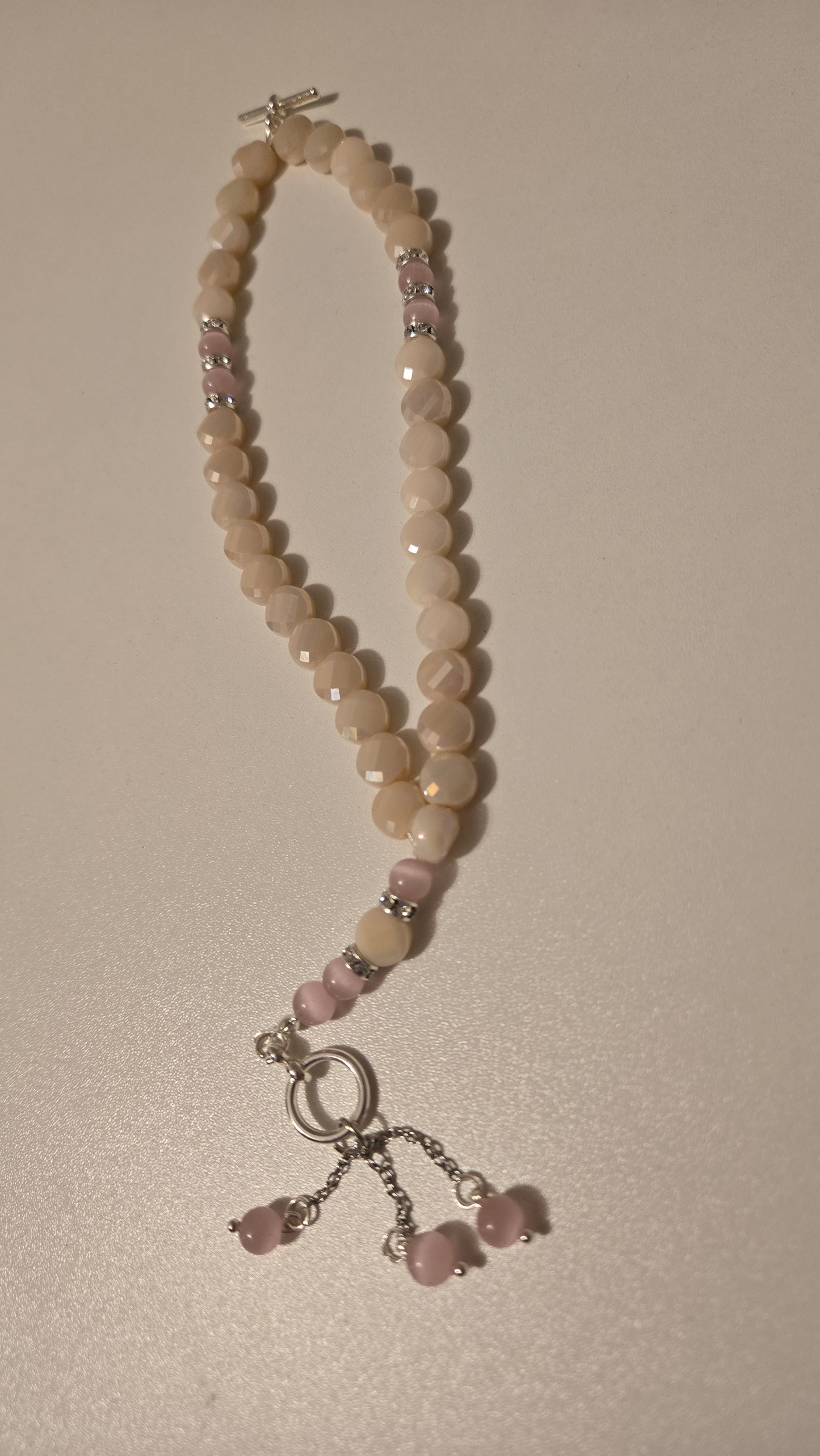 Rose Light Tasbih displayed elegantly with soft lighting