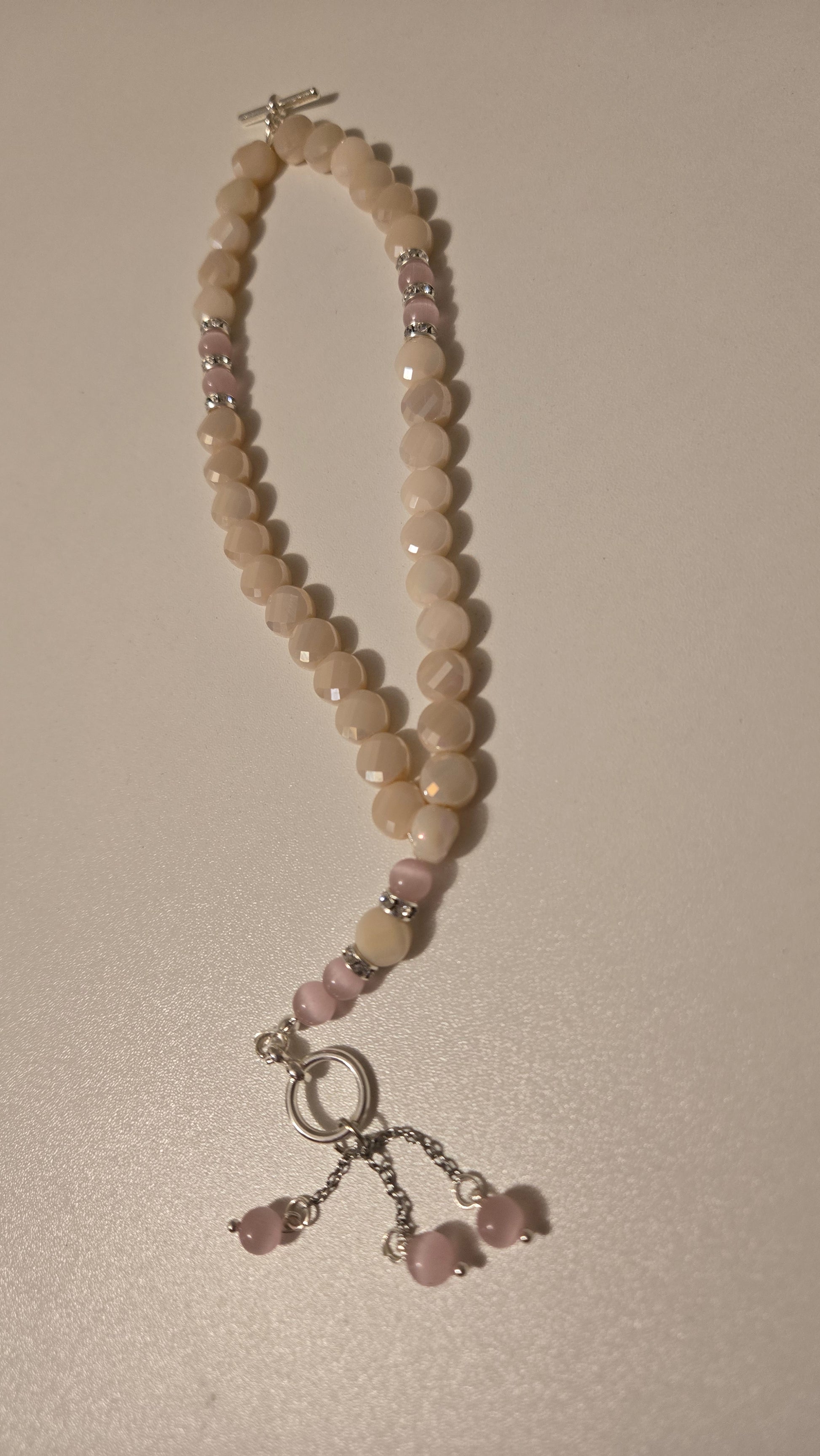 Rose Light Tasbih displayed elegantly with soft lighting