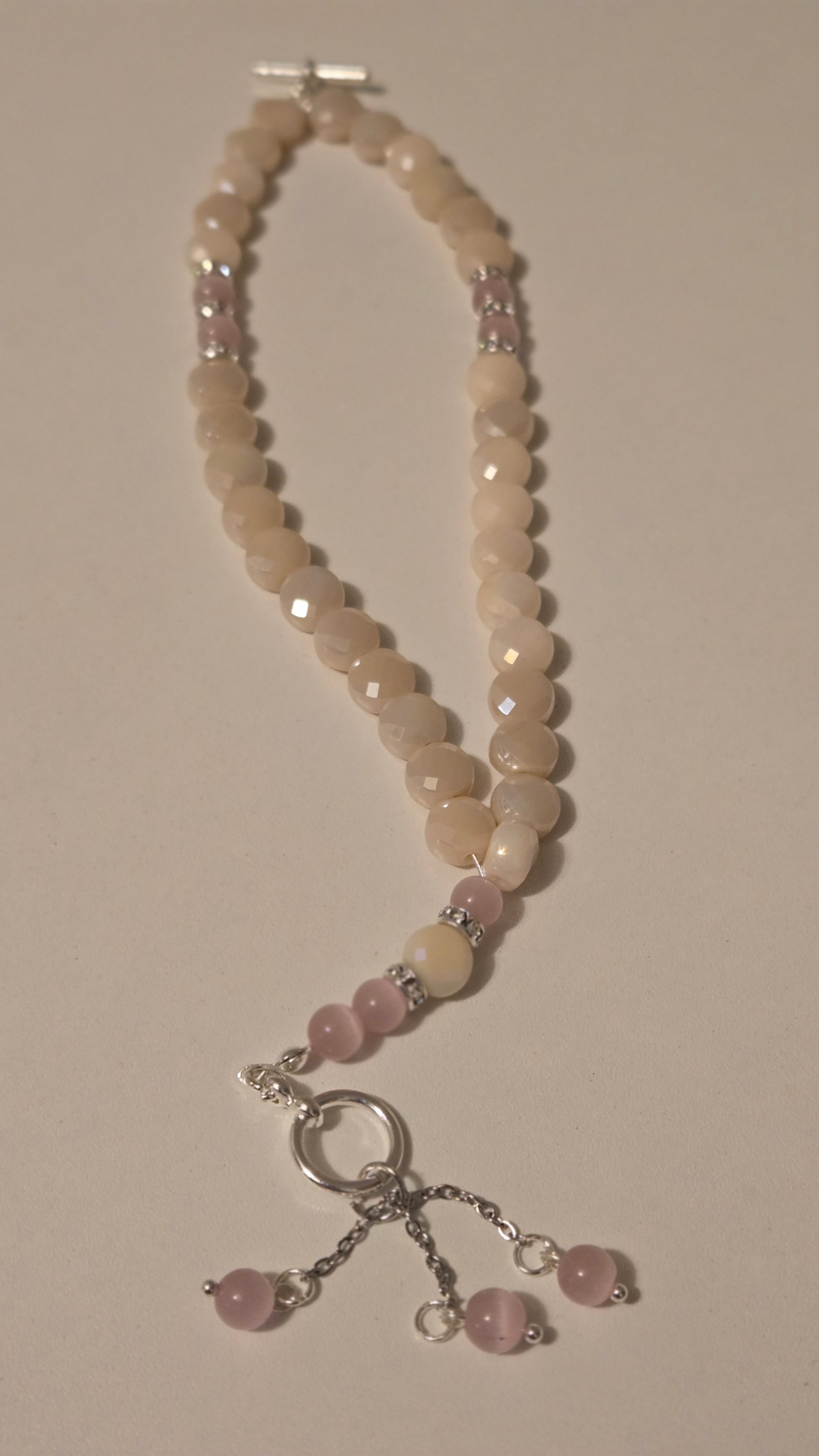 Rose Light Tasbih with a focus on the beautiful craftsmanship