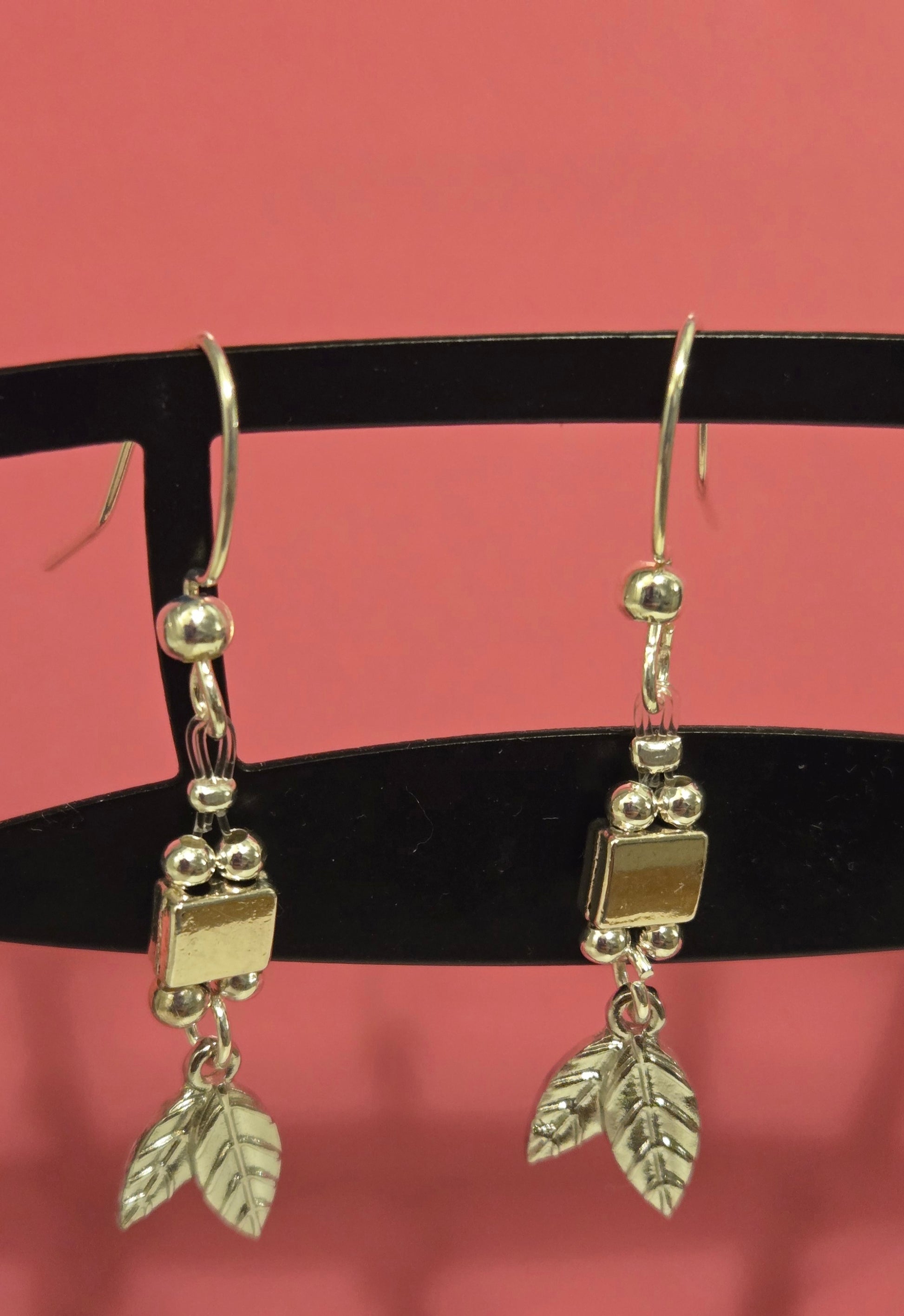 Silver Leaf Drop Earrings displayed in a gift box, perfect for any occasion