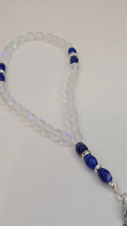 Crystal Serenity Tasbih with clear glass beads, blue accents and silver-plated spacers, view 8