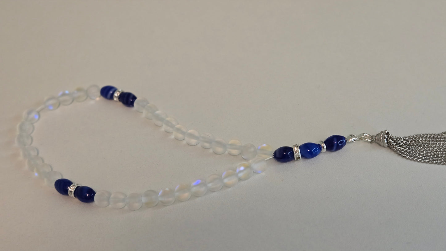 Elegant glass bead tasbih with clear and blue elements