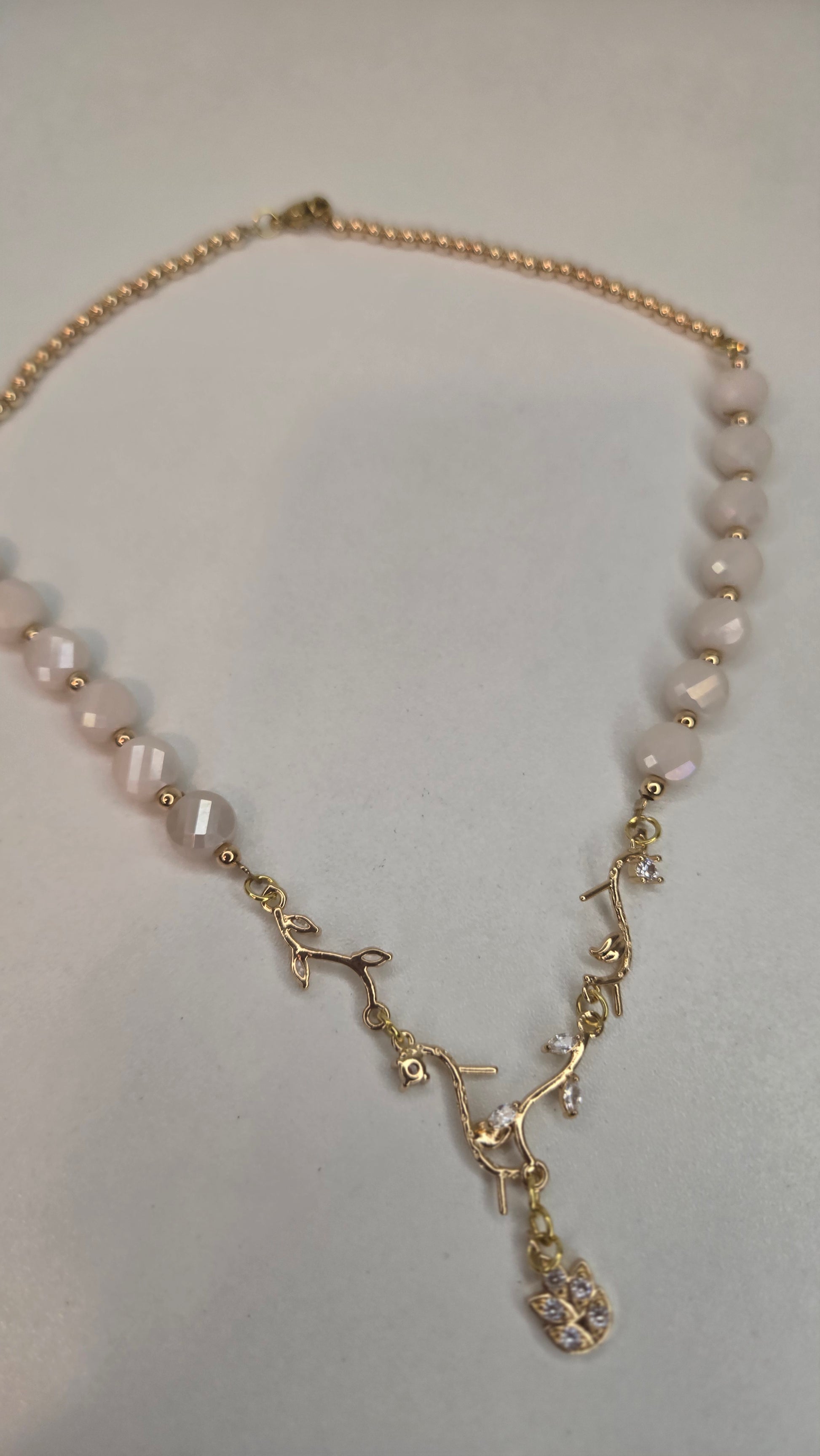 Model wearing Pearl Branch Necklace, highlighting its graceful drape