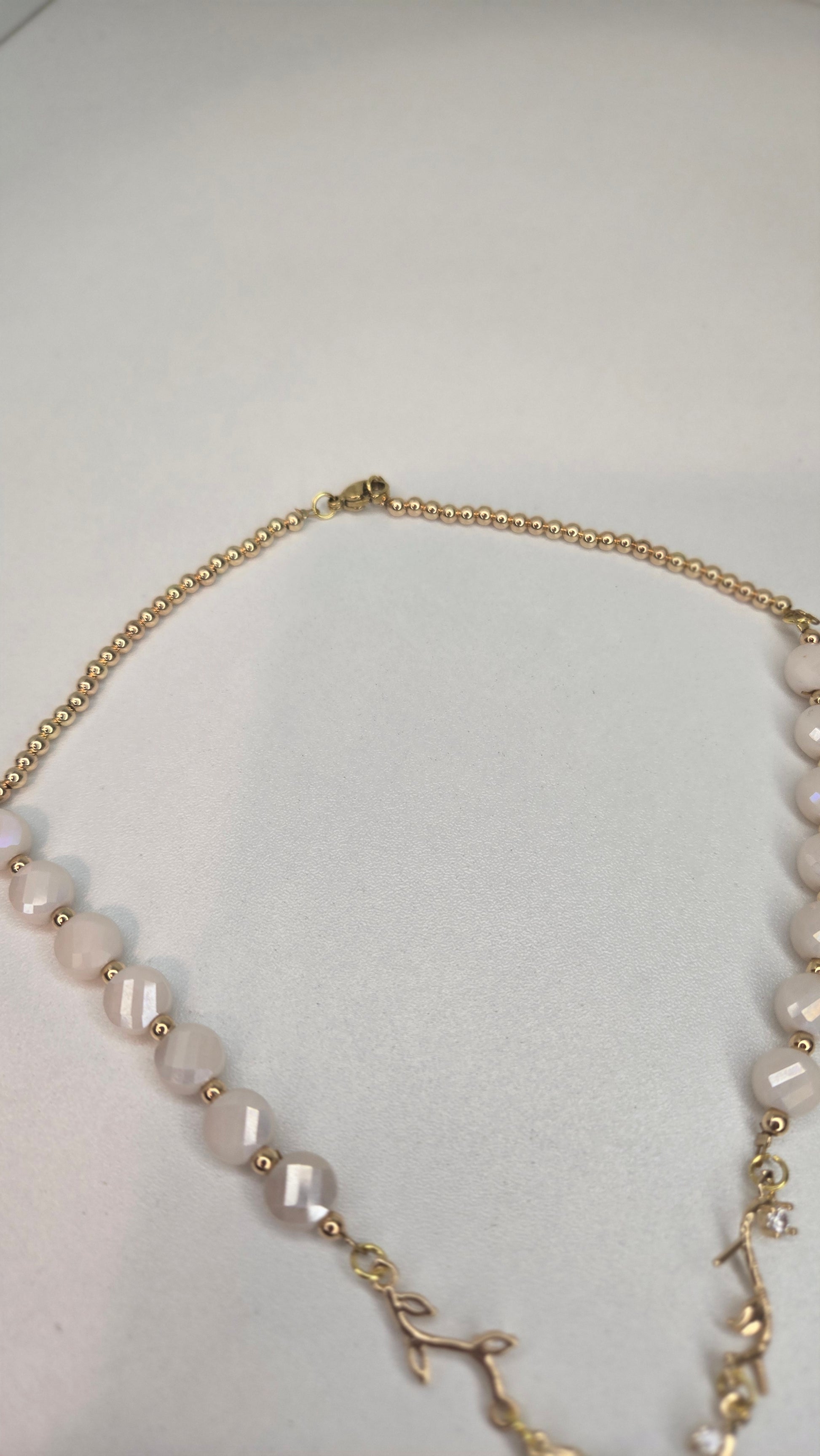 Pearl Branch Necklace laid flat on a white background, full length