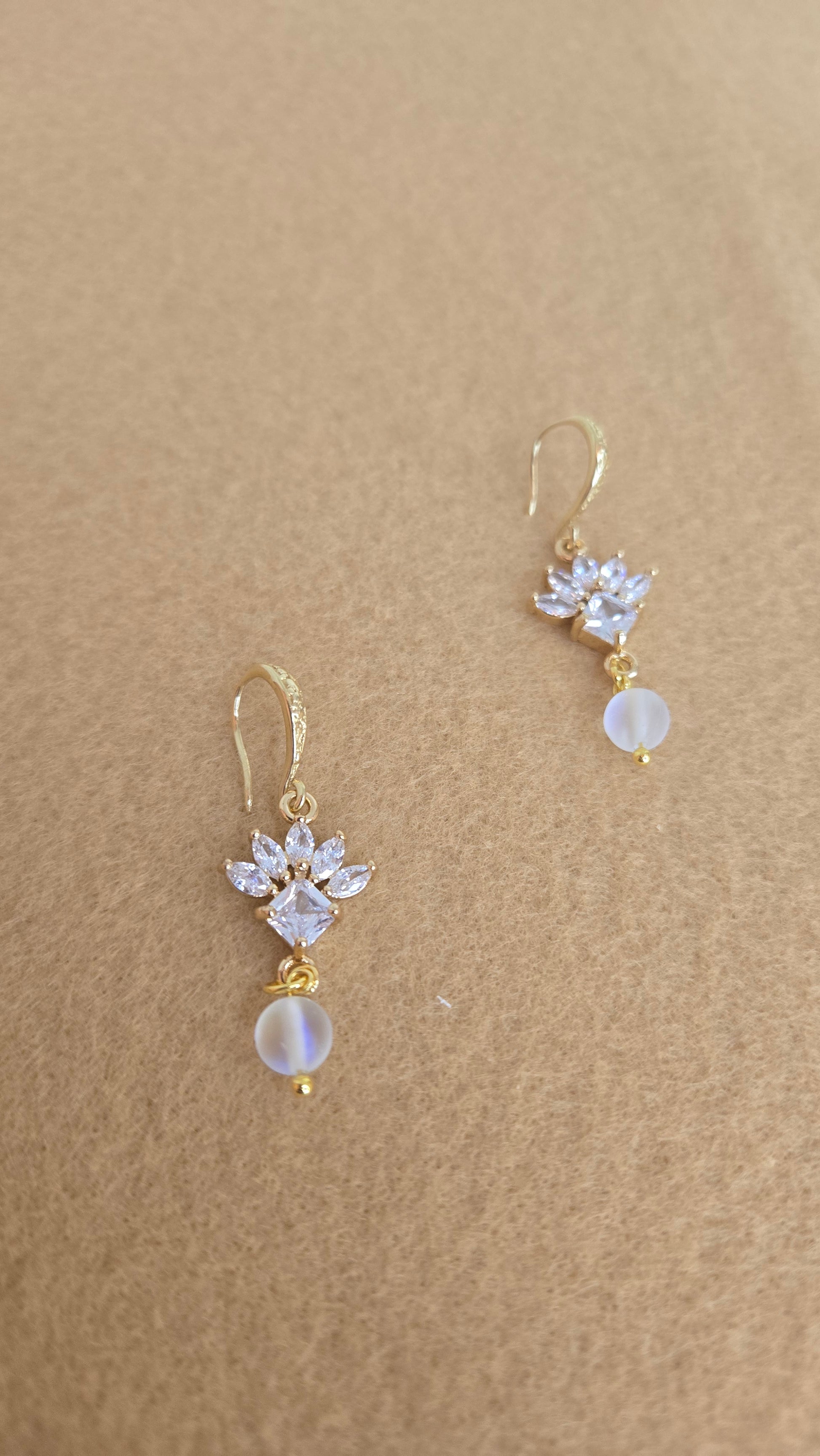 Luminous Flower Earrings, side view, highlighting the glass bead