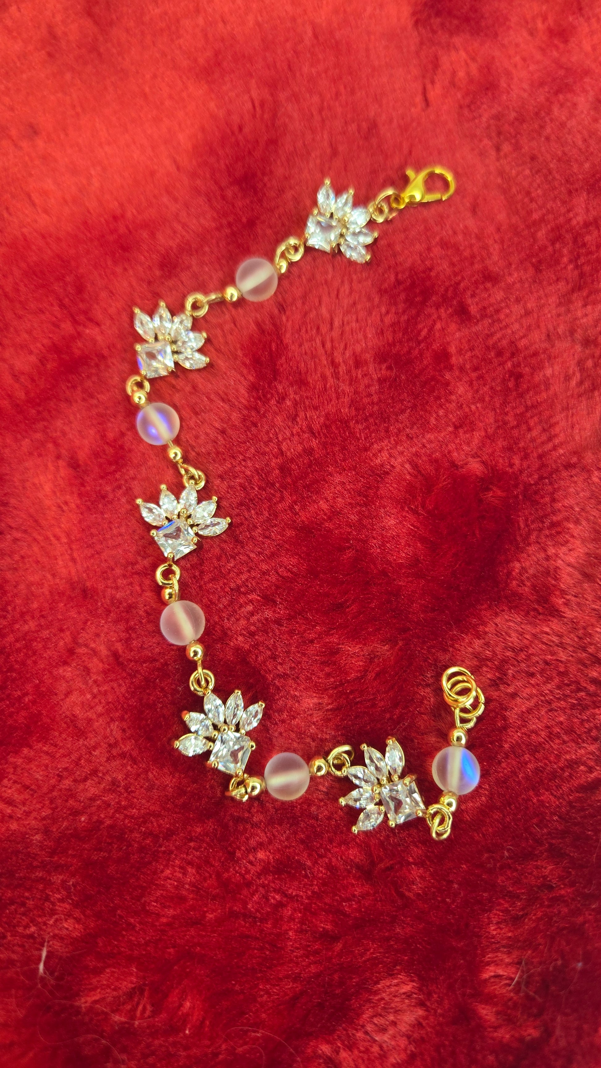 Close-up of Crystal Blossom Bracelet with sparkling crystal flowers and iridescent beads