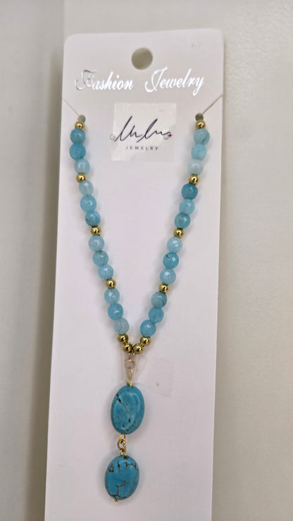 Light Blue Quartz Necklace with three drop-shaped stones and golden spacers, view 3