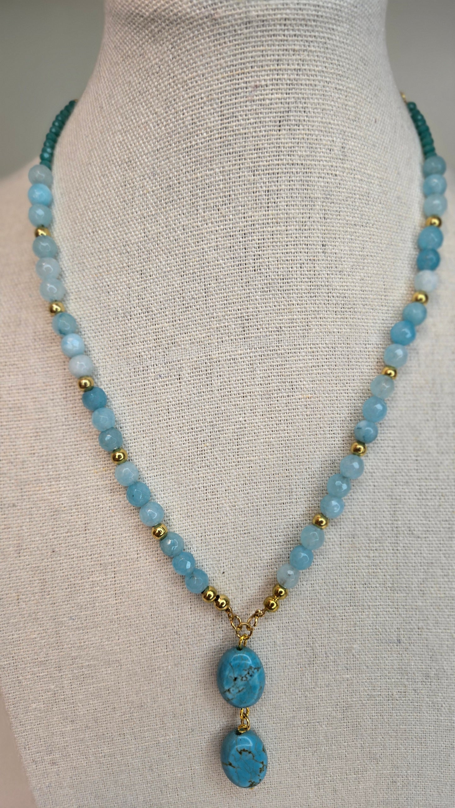 Side profile of the unique drop quartz pendant and handcrafted chain