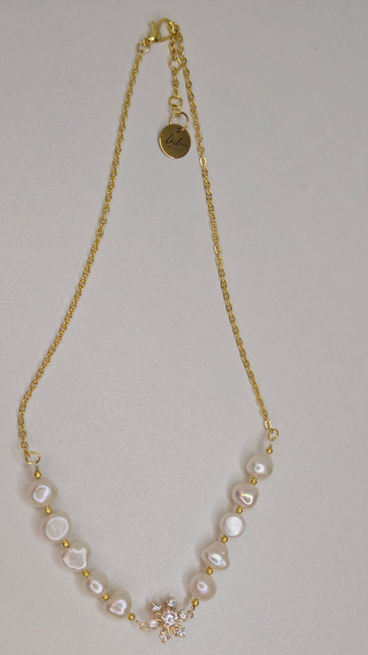 Pearl Blossom Gold-Tone Necklace with white bead accents and a floral centerpiece, view 6