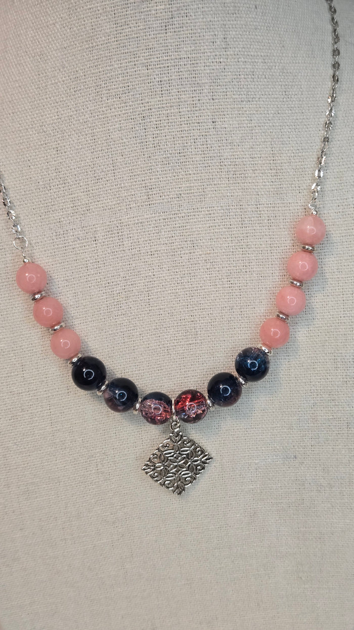 Blush & Midnight Charm Necklace with pink and dark beads and a silver charm