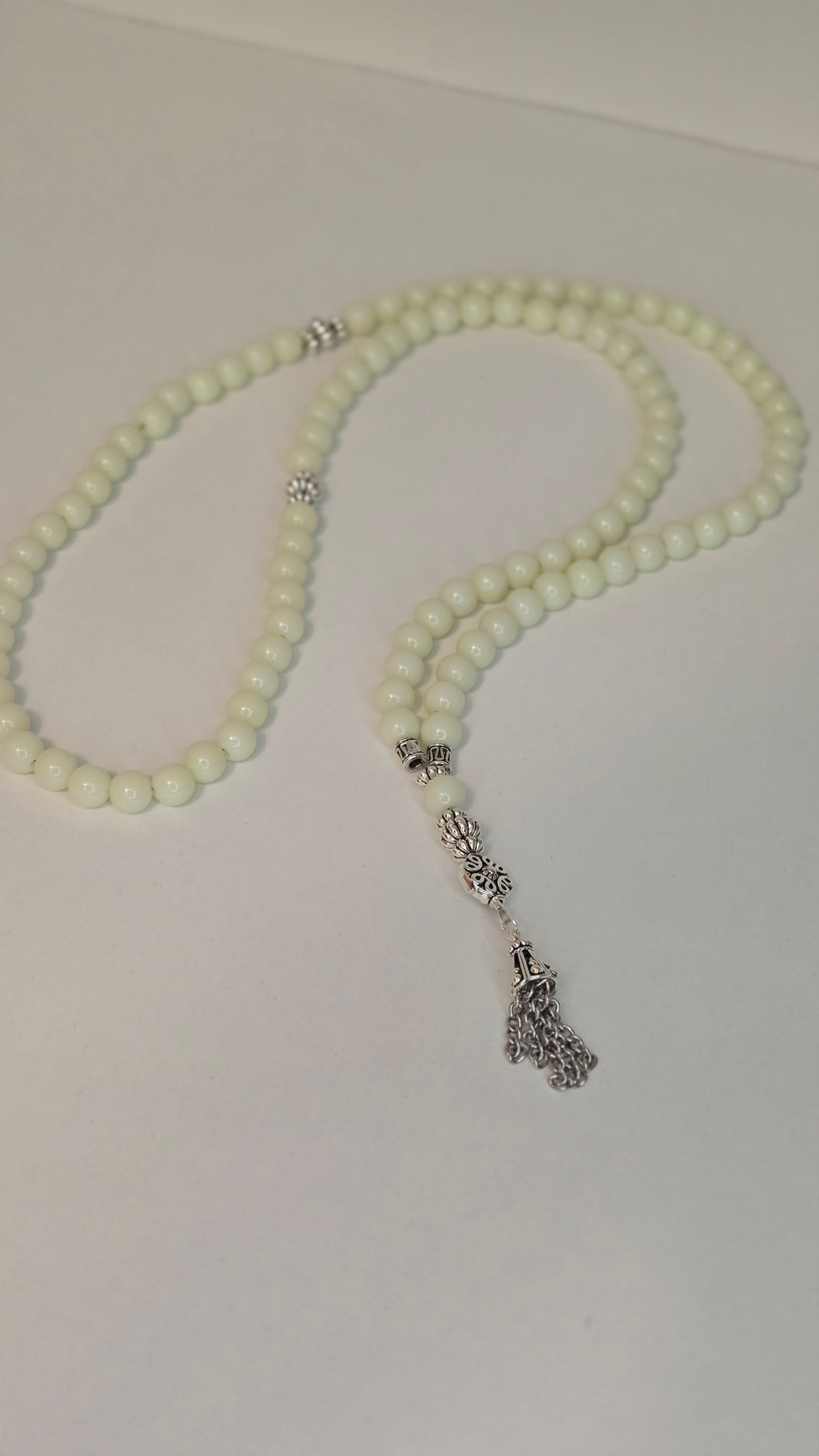 Luminous Glow Prayer Beads displayed in natural light.