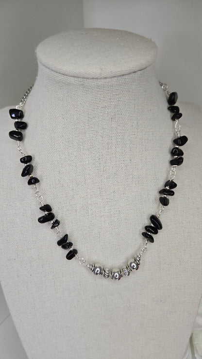 Silver Shadow Necklace with dark beads and soft metallic accents
