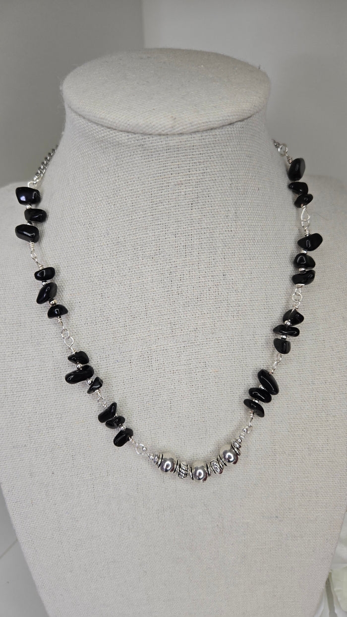 Silver Shadow Necklace with dark beads and soft metallic accents