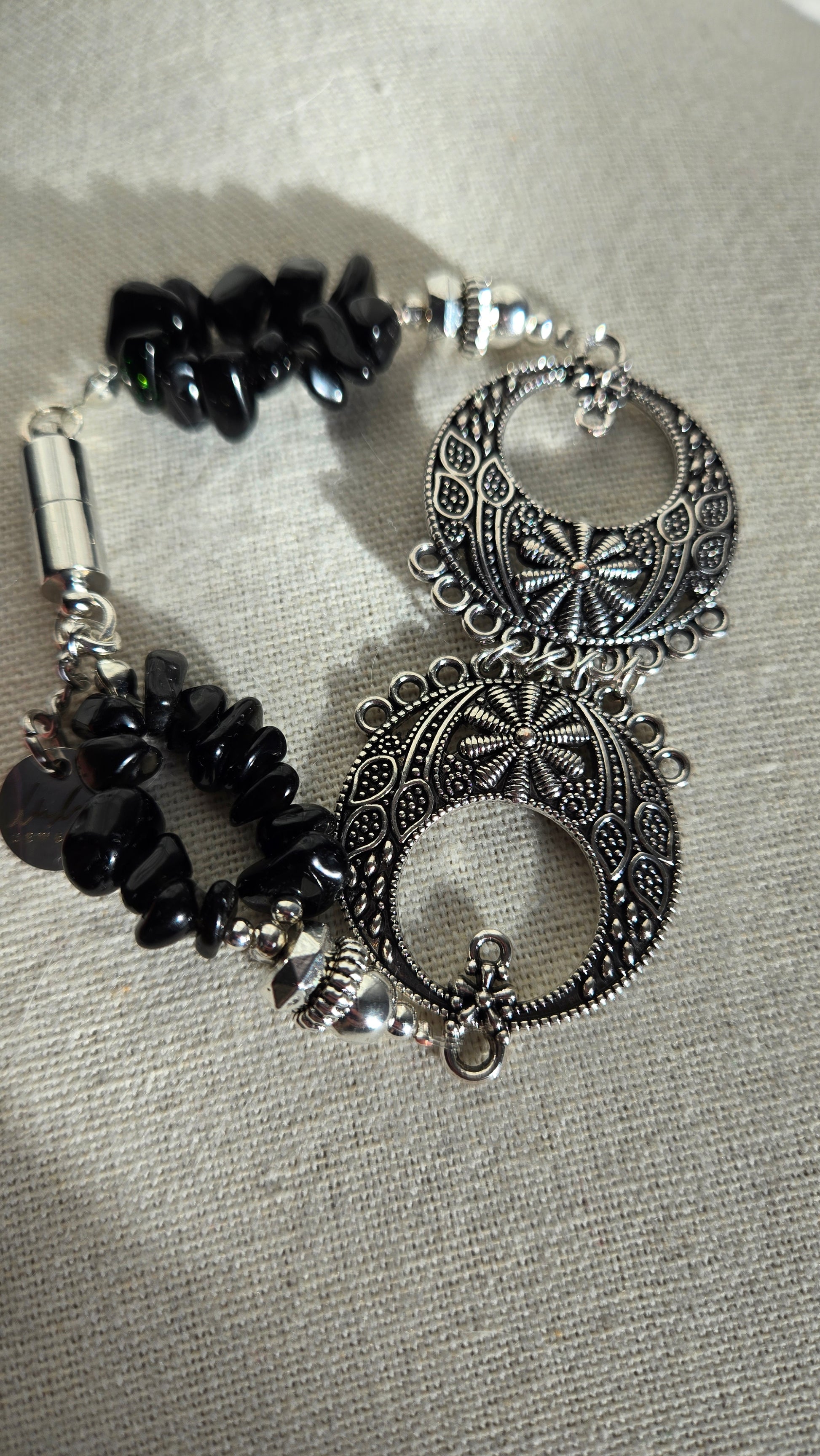 Gift box open with the Black Moon Bracelet nestled inside, ready for gifting.